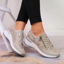 Sneakersy na koturnie Rieker W N4327-80 beżowe 39